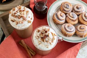 Charleston Coffee Roasters Cinnamon Roll Coffee with Maple Cream Cheese Whipped Cream - Top of Mug of Cinnamon Roll Coffee